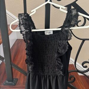 Girls GORGEOUS Black sleeveless romper with lace size small 7/8